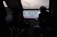 Voyageur dans le train à vapeur Poznan - Wolsztyn